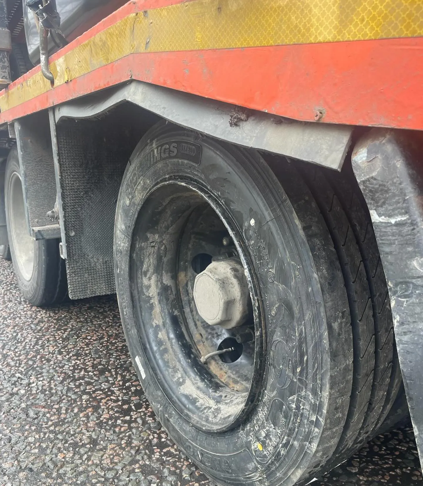 A close up of a tire on a truck.