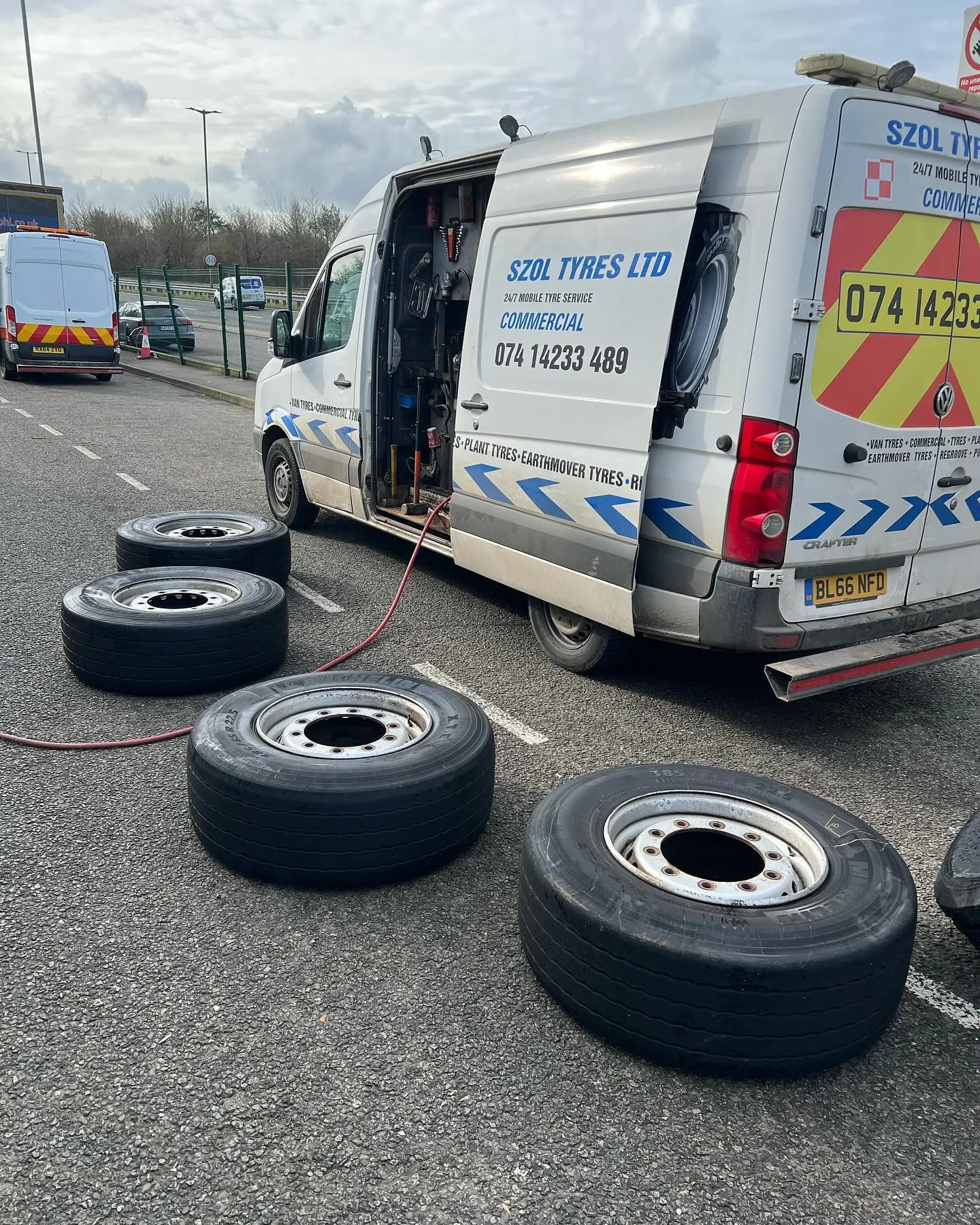 A van is parked on the side of the road.