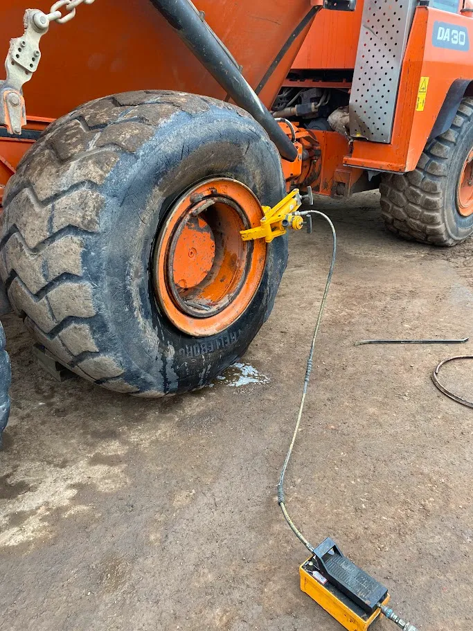 A couple of large tires sitting next to each other.